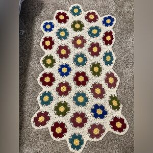 Homemade crochet throw blanket with granny squares hexagon floral motif